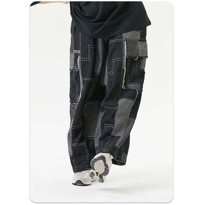 Adotuastic - Laag uitgesneden patchwork cargojeans met wijde pijpen