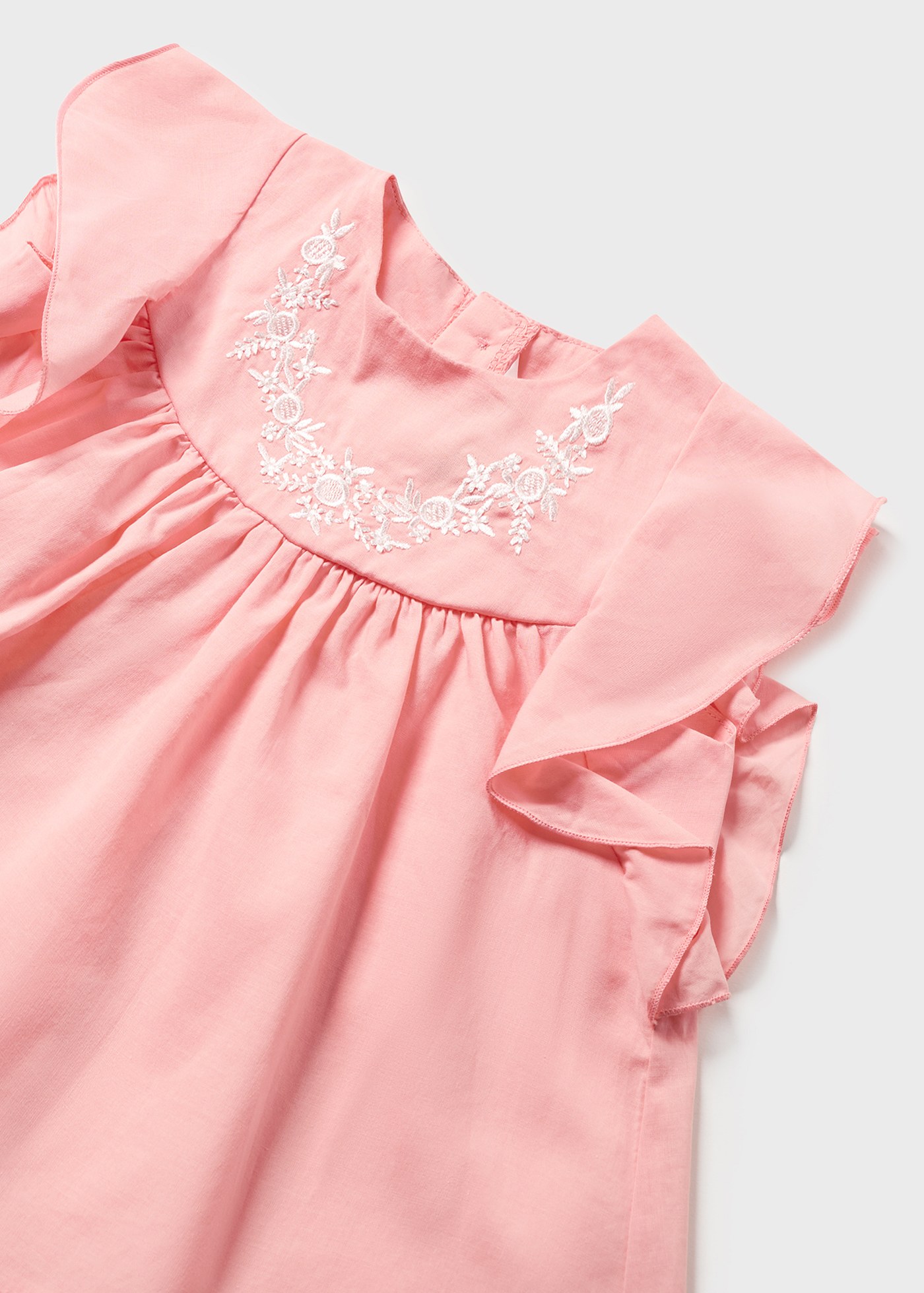 Blusa sem mangas com bordado para bebê