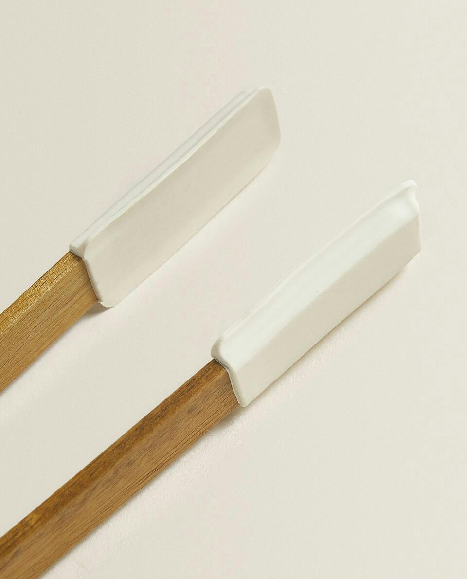 Pinças de silicone e madeira