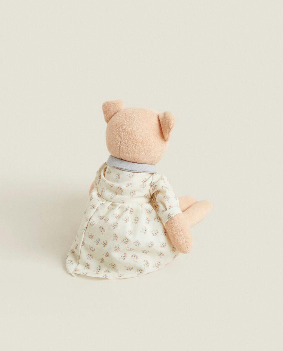 Porquinho de pelúcia infantil vestido