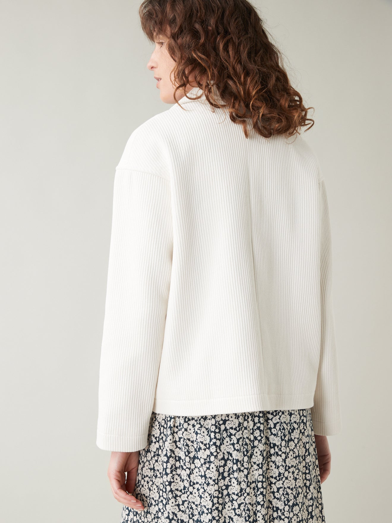 Manteau court tissu natté femme