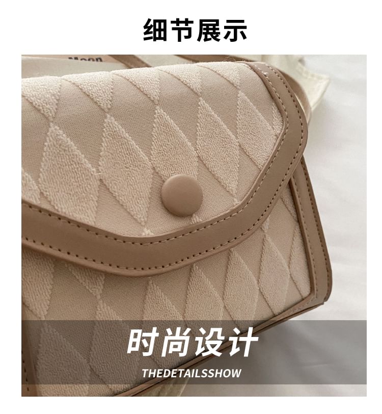 Basaran - Crossbodytas met contrasterende rand en klep