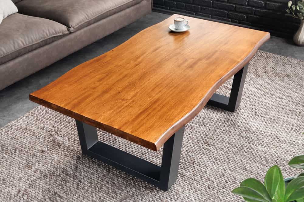 Massiver Couchtisch GENESIS 110cm braun Akazienholz Baumkante V-Gestell