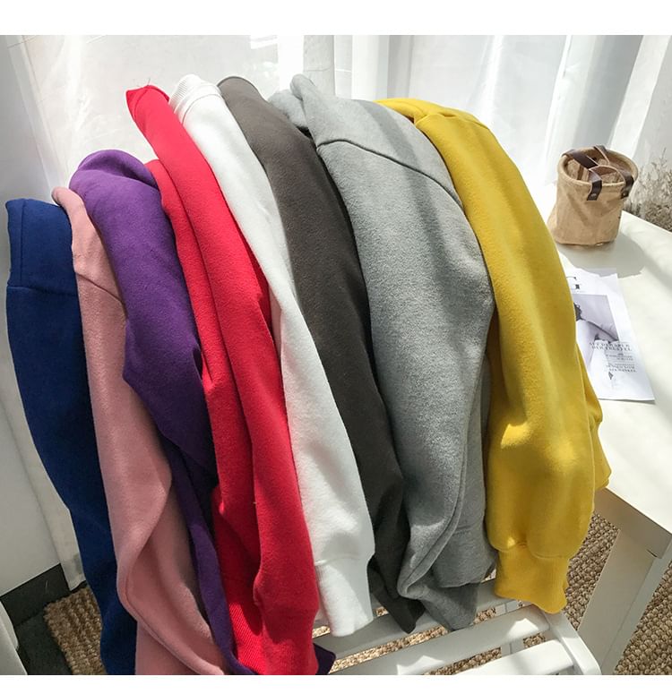 CosmoCorner - Effen ronde hals losvallende sweatshirt