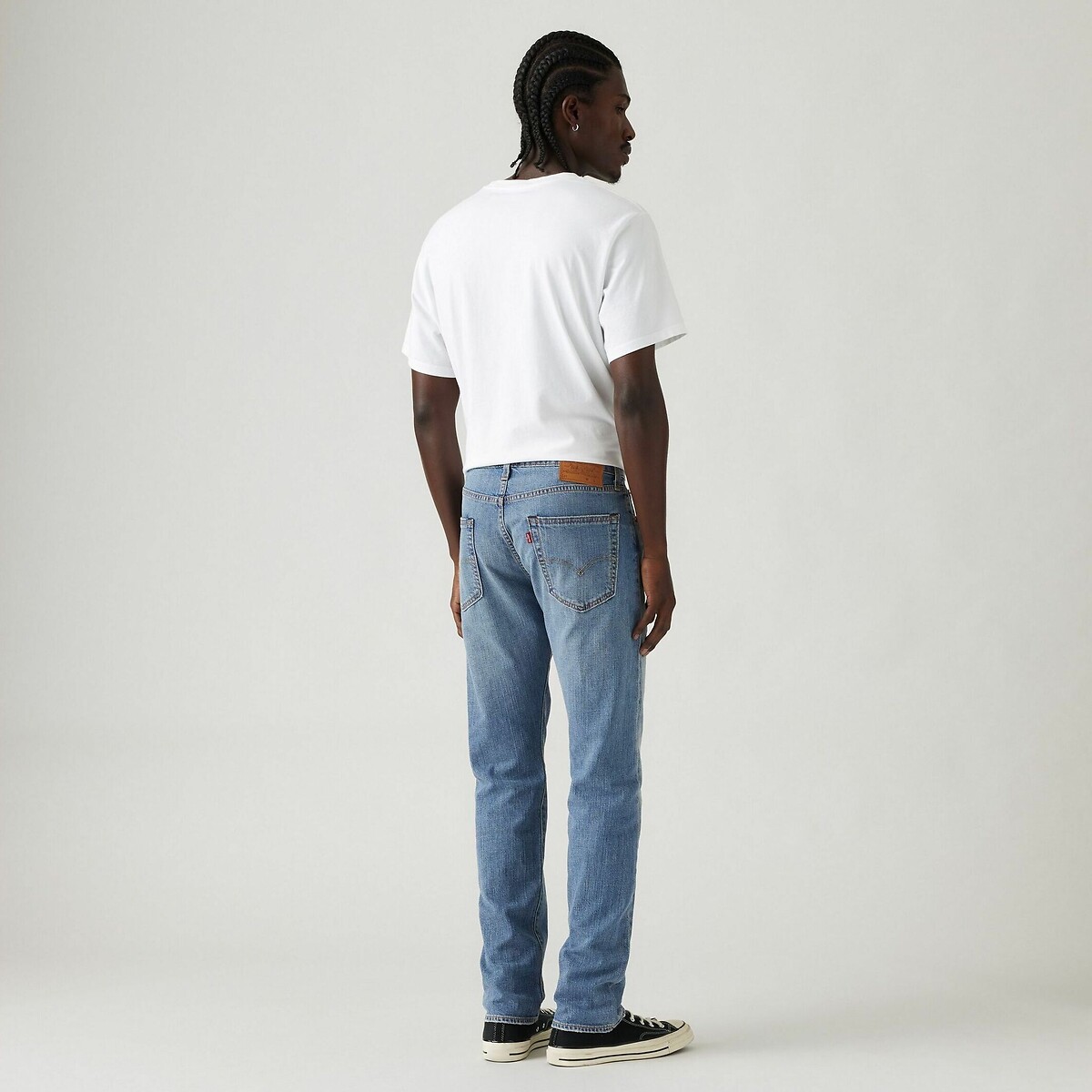 Calça jeans reta LEVI'S Taper 502® em algodão e linho