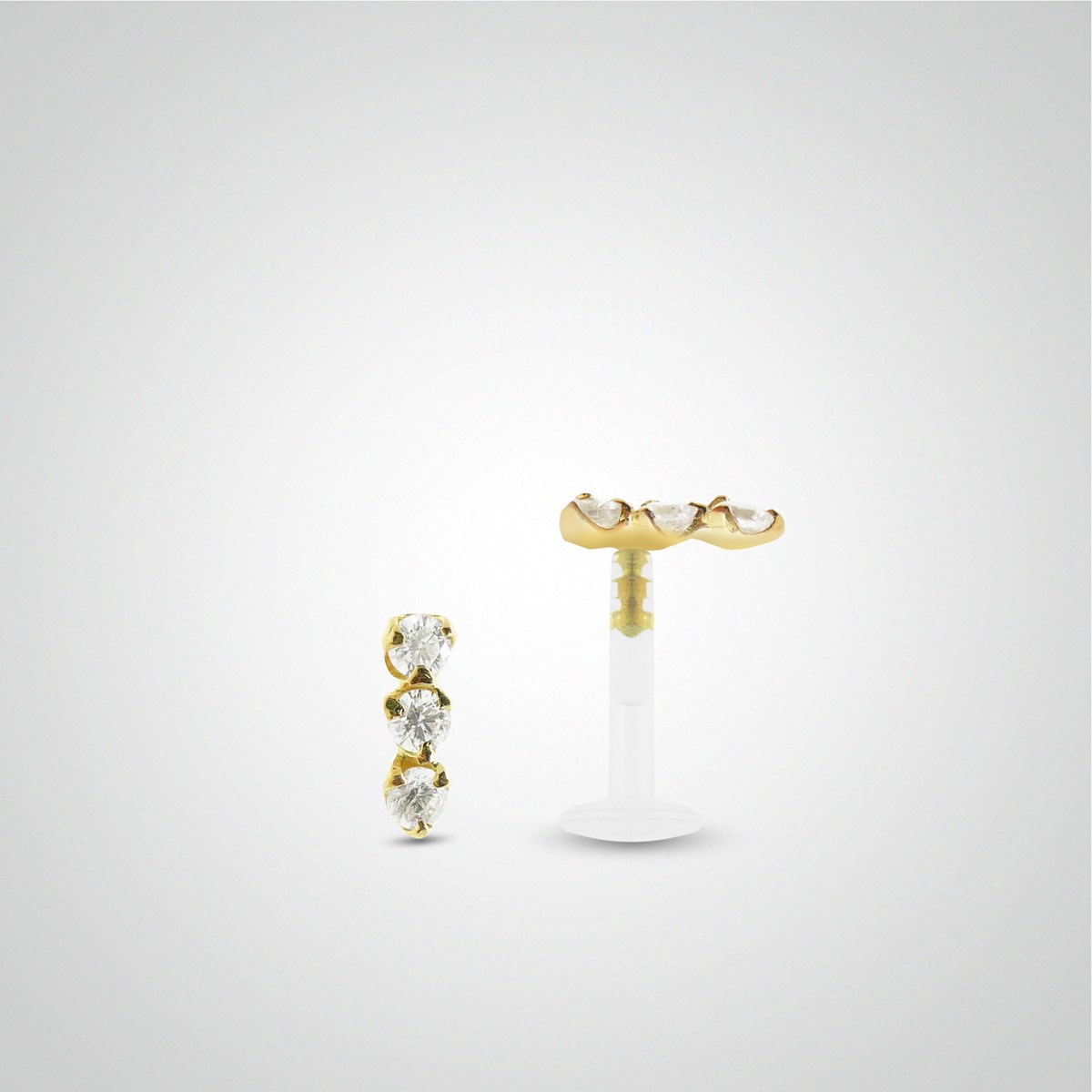 Piercing conch or jaune avec trois oxydes zirconium blancs 2 mm
