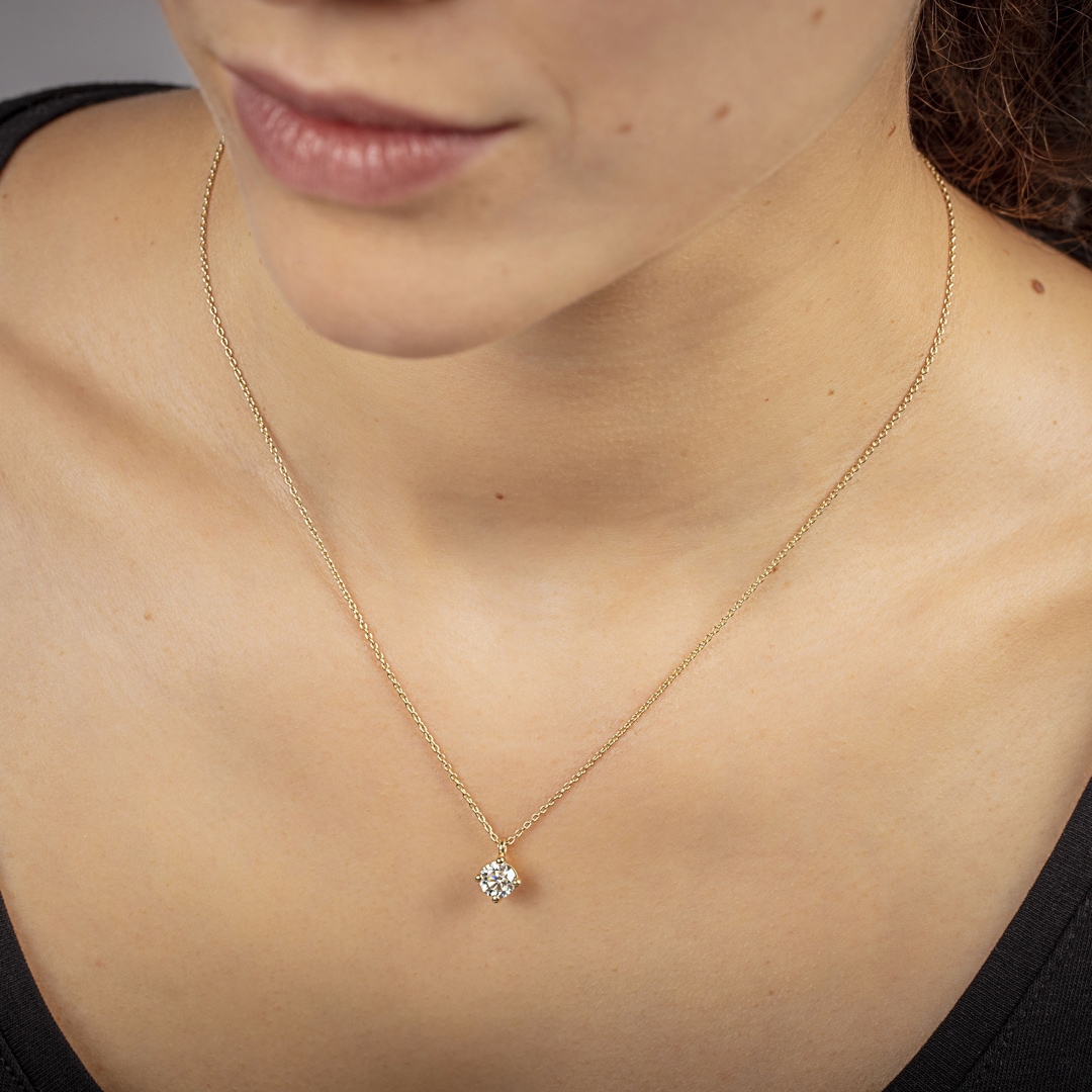 Collier mit Anhänger 750/18 K Gelbgold mit GIA-Diamant 1.00 ct H/si in 4-Griff