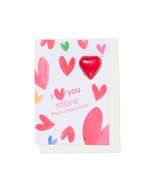 carte de voeux avec coeur en chocolat et mélange de fleurs