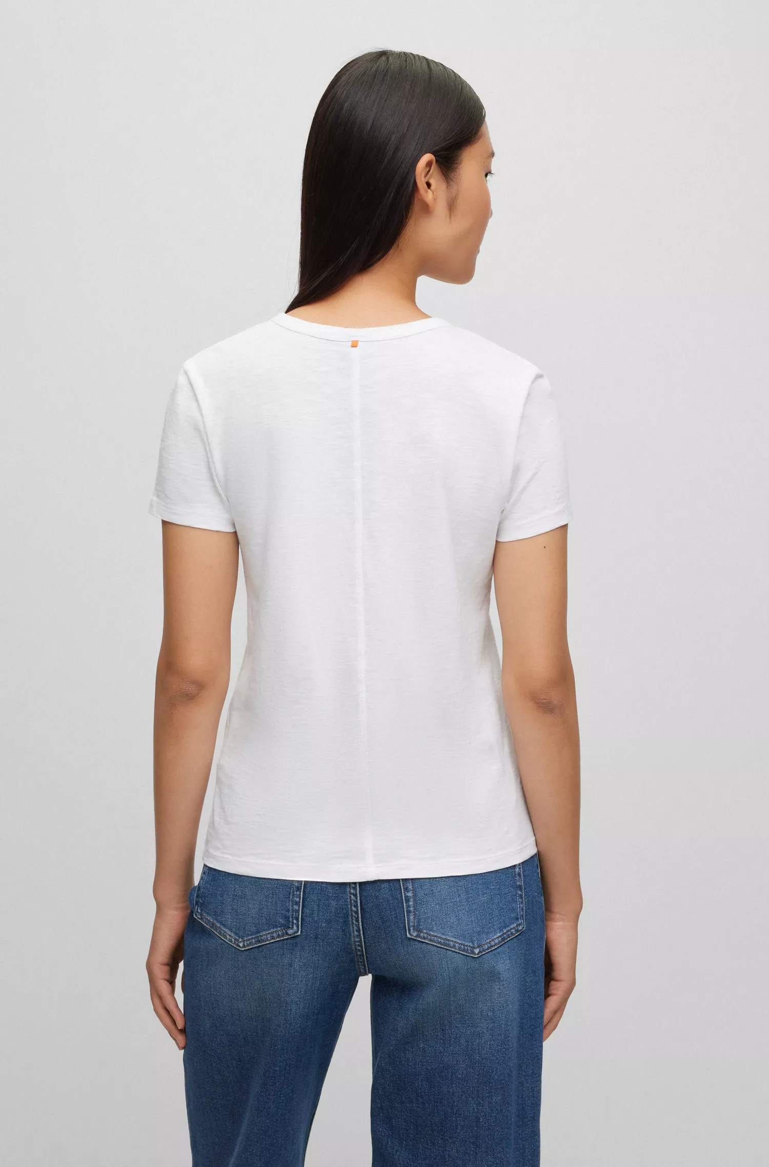 Camiseta BOSS laranja, corte regular, em algodão texturizado.