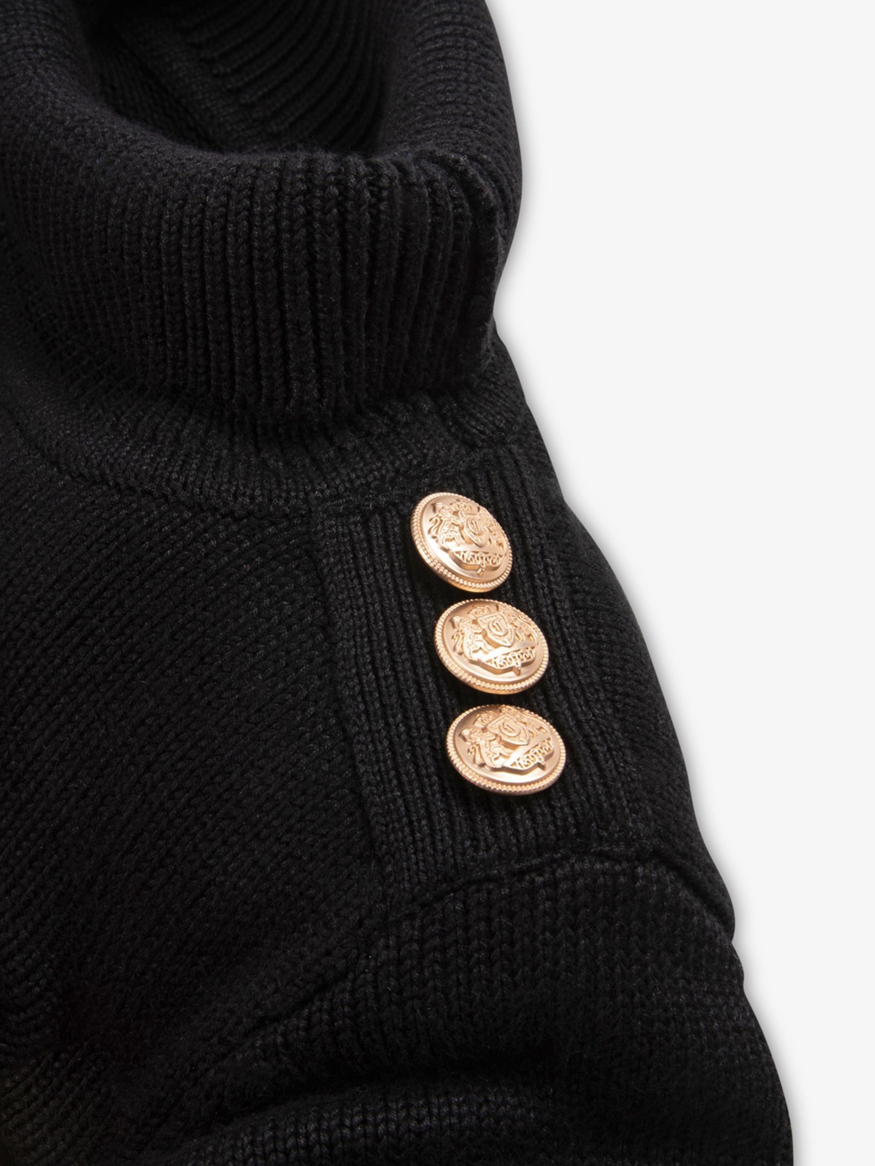 The Little Tailor luxe gebreide zwarte kersttrui voor kinderen met decoratieve knoopdetails