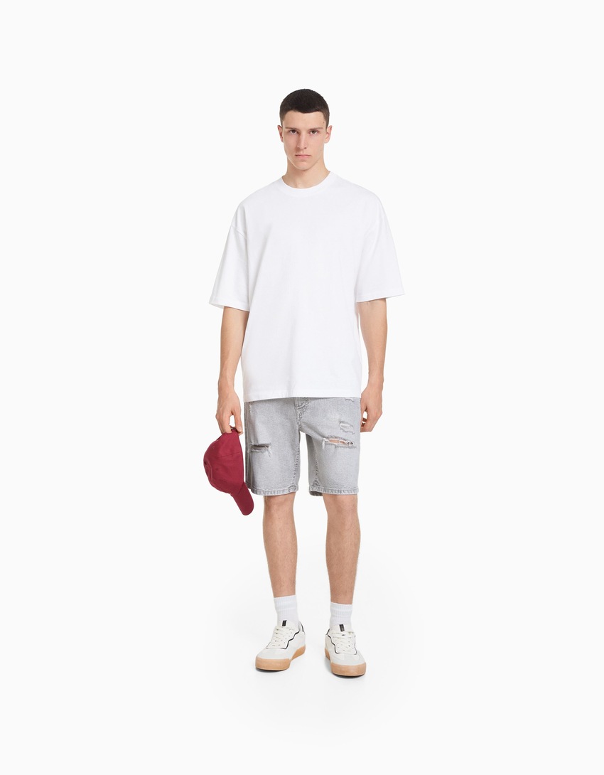 Bermuda jeans rasgada