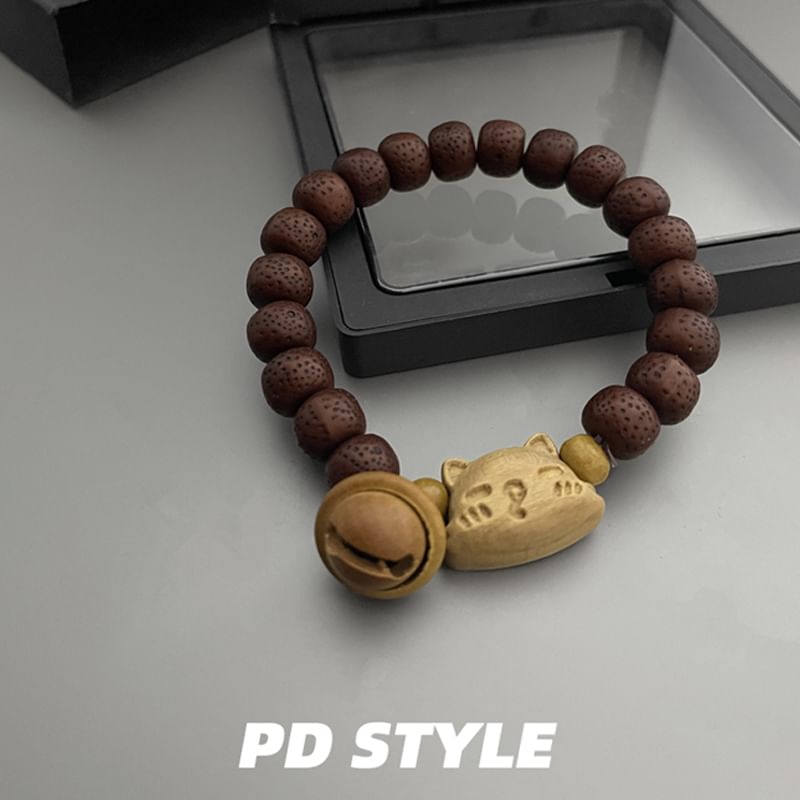 Elnge - Houten armband met dieren, gesneden kralen en bel