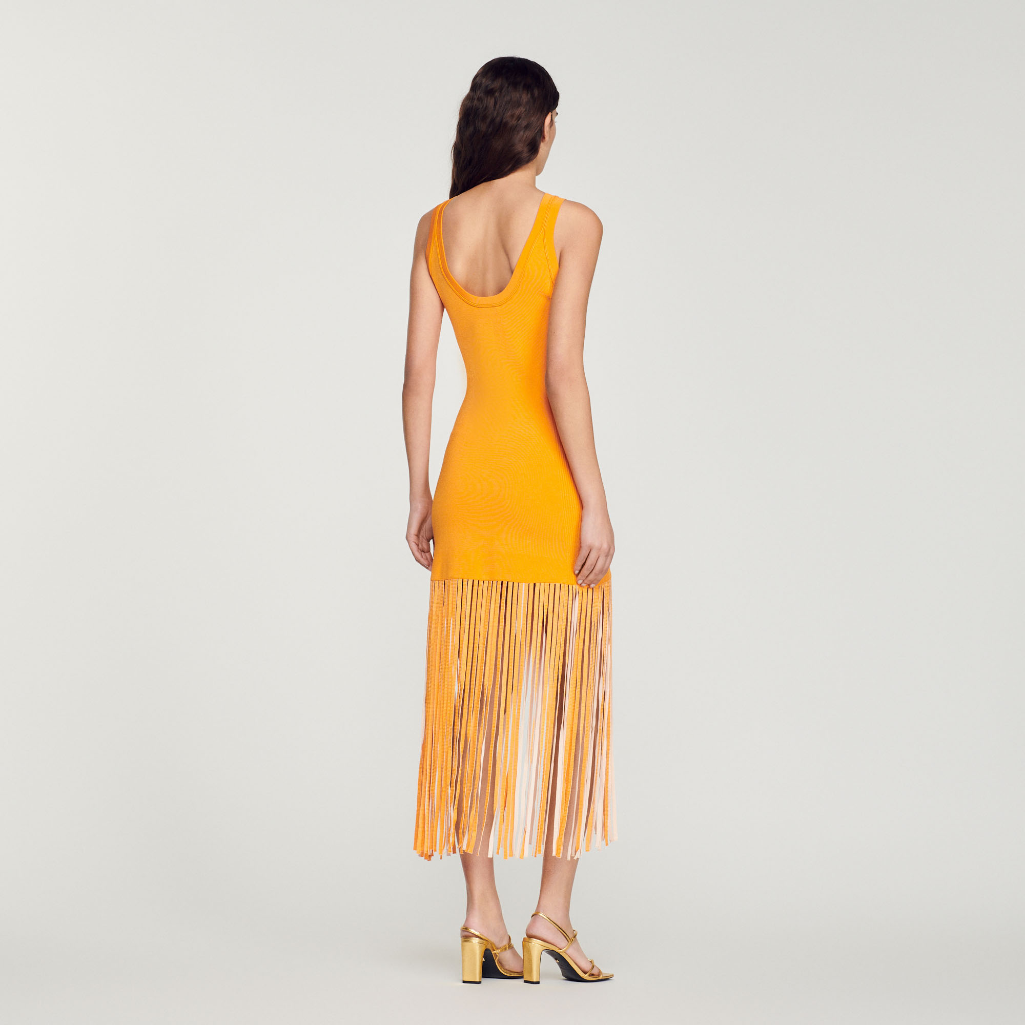 Robe en maille frangee