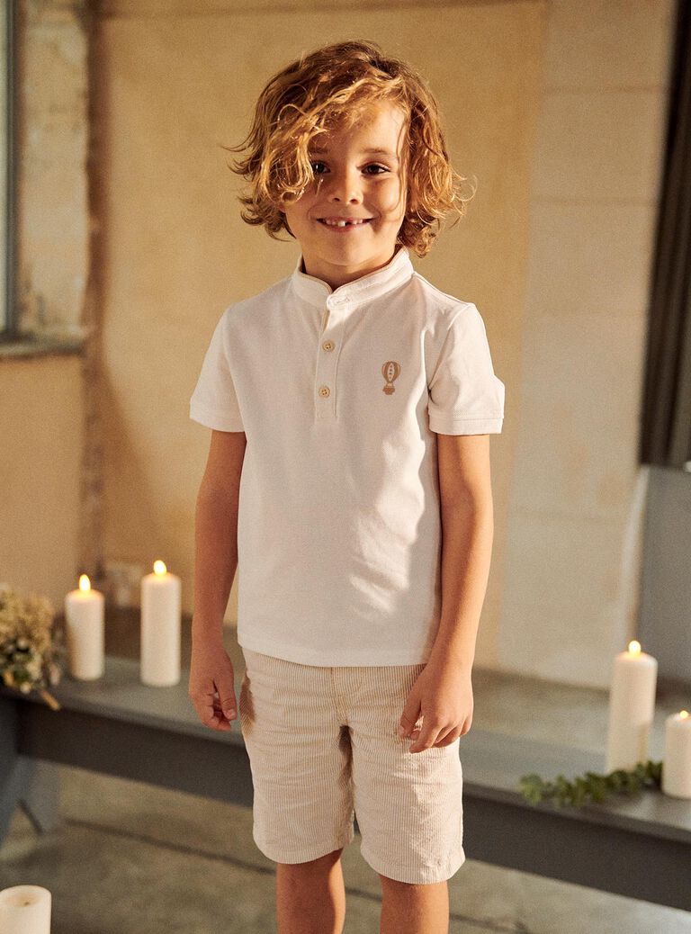 Polo blanc avec montgolfière