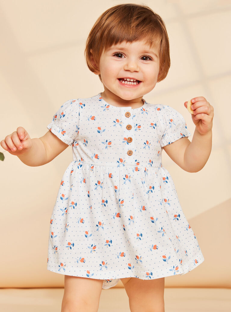 Robe écrue avec body intégré à imprimé fleuri