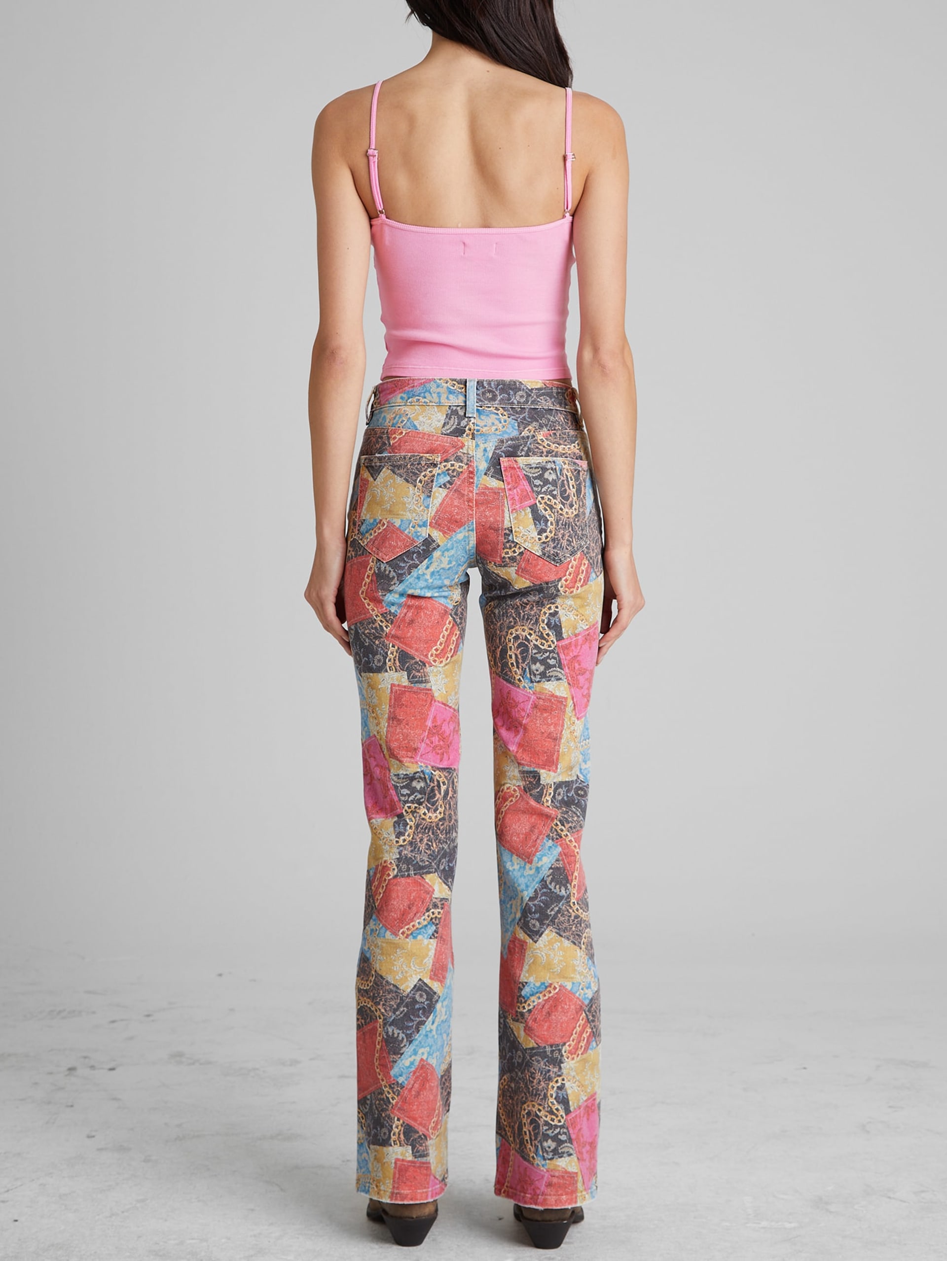 Calça jeans flare estampada