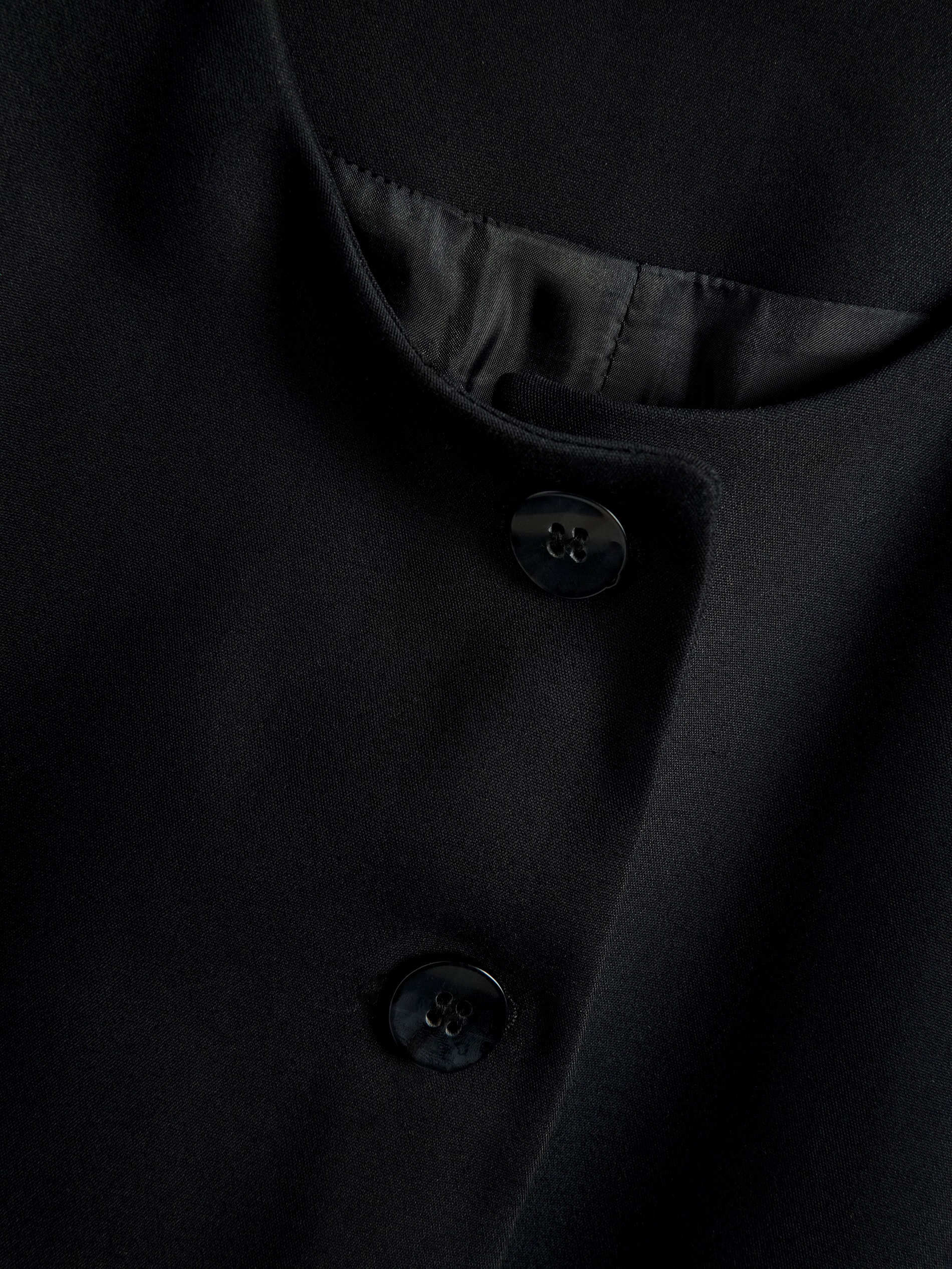 Gilet mit Falten