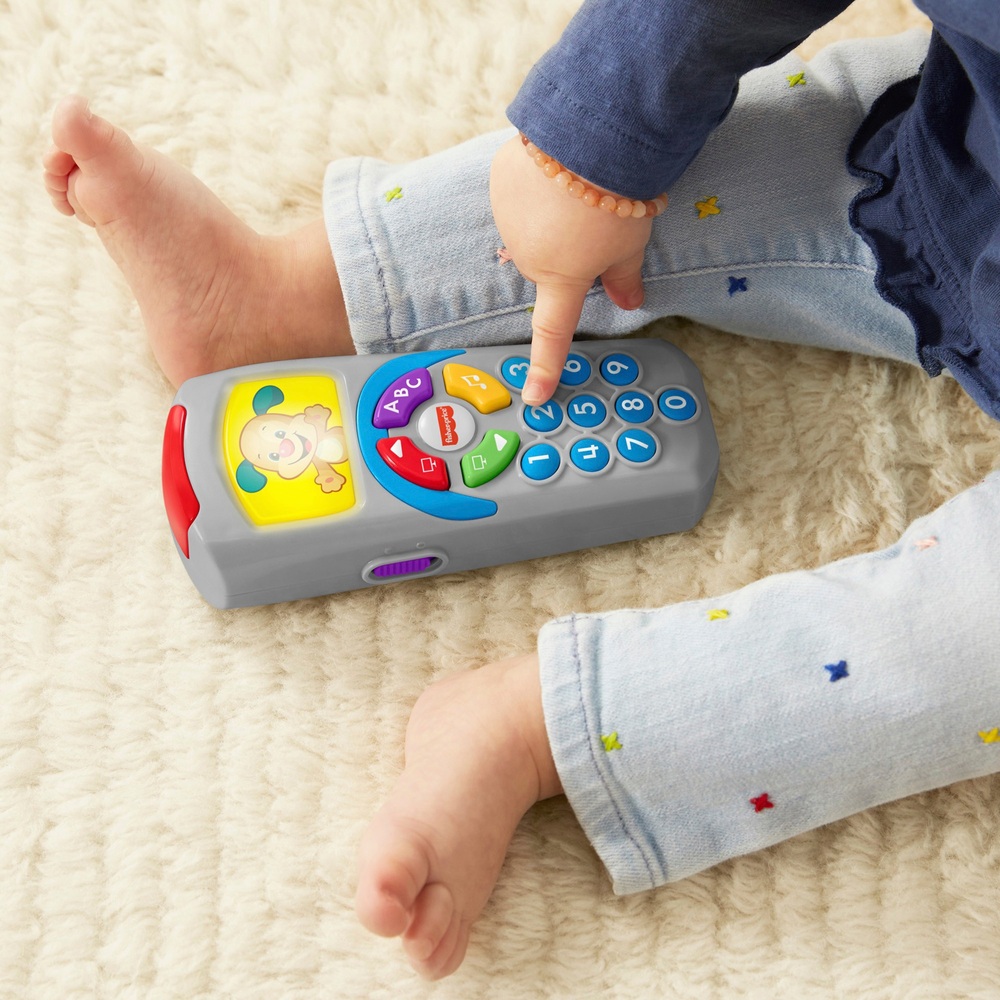 Fisher-Price Lachen & Lernen Welpen-Fernbedienungs-Musikspielzeug