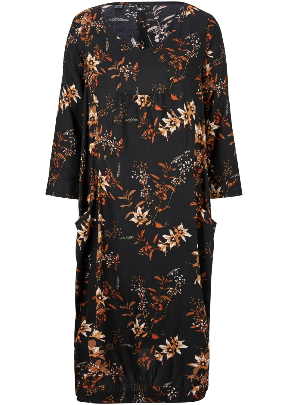 Robe en viscose avec poches en forme de O, sous-genou