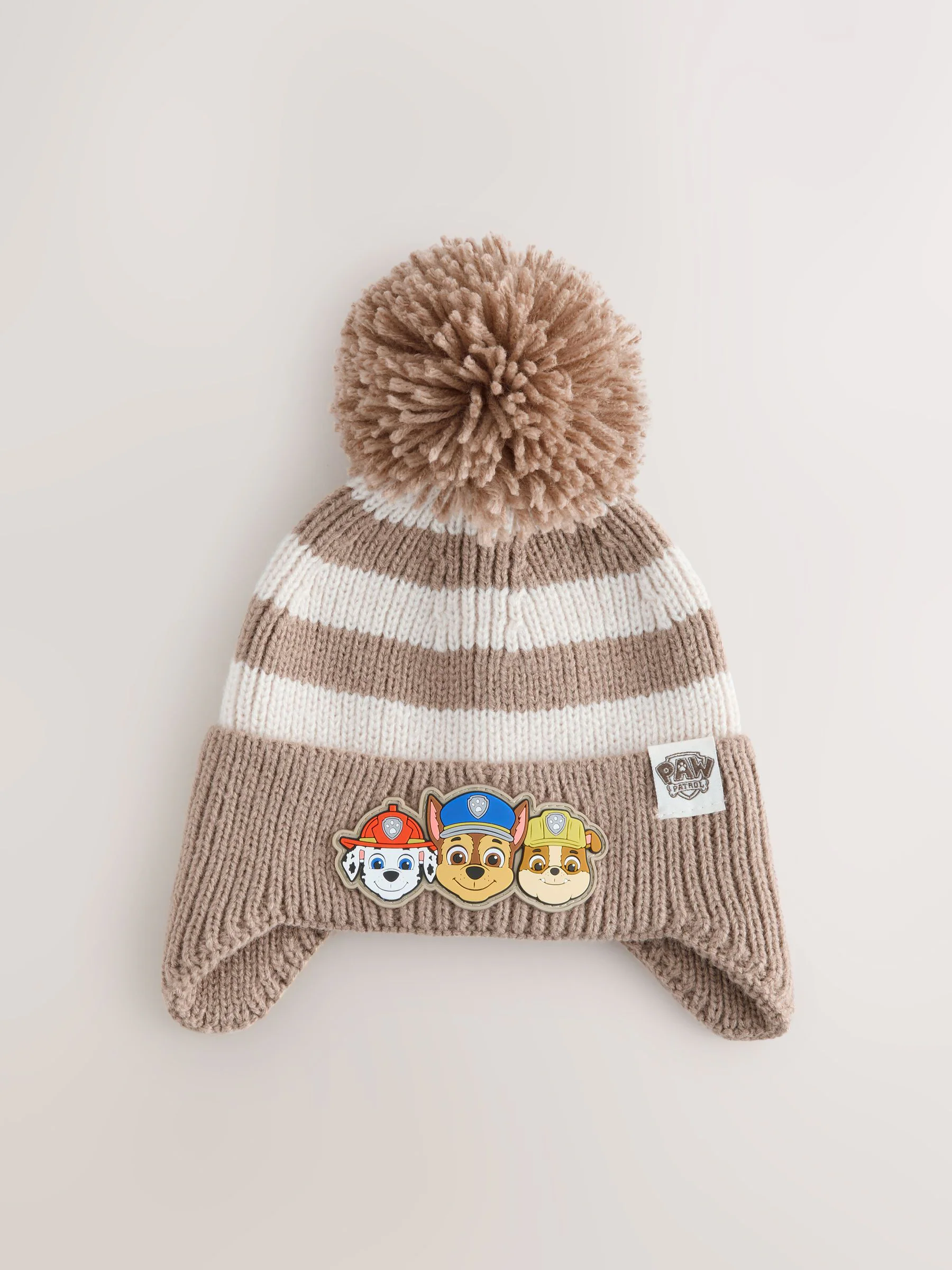 Crème/wit gestreept - Paw Patrol oorflapmuts met pompon (1-6jaar)
