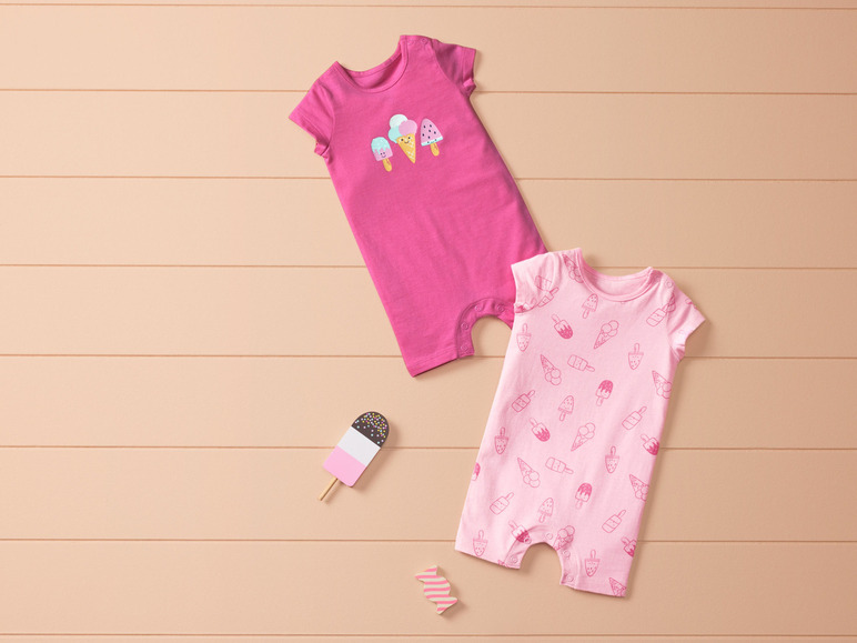 2 baby playsuits