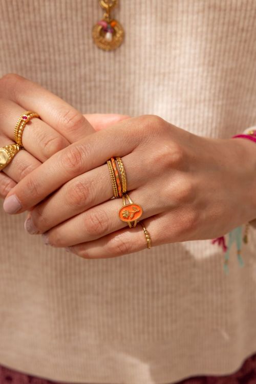 Art oranje statement ring met bloem