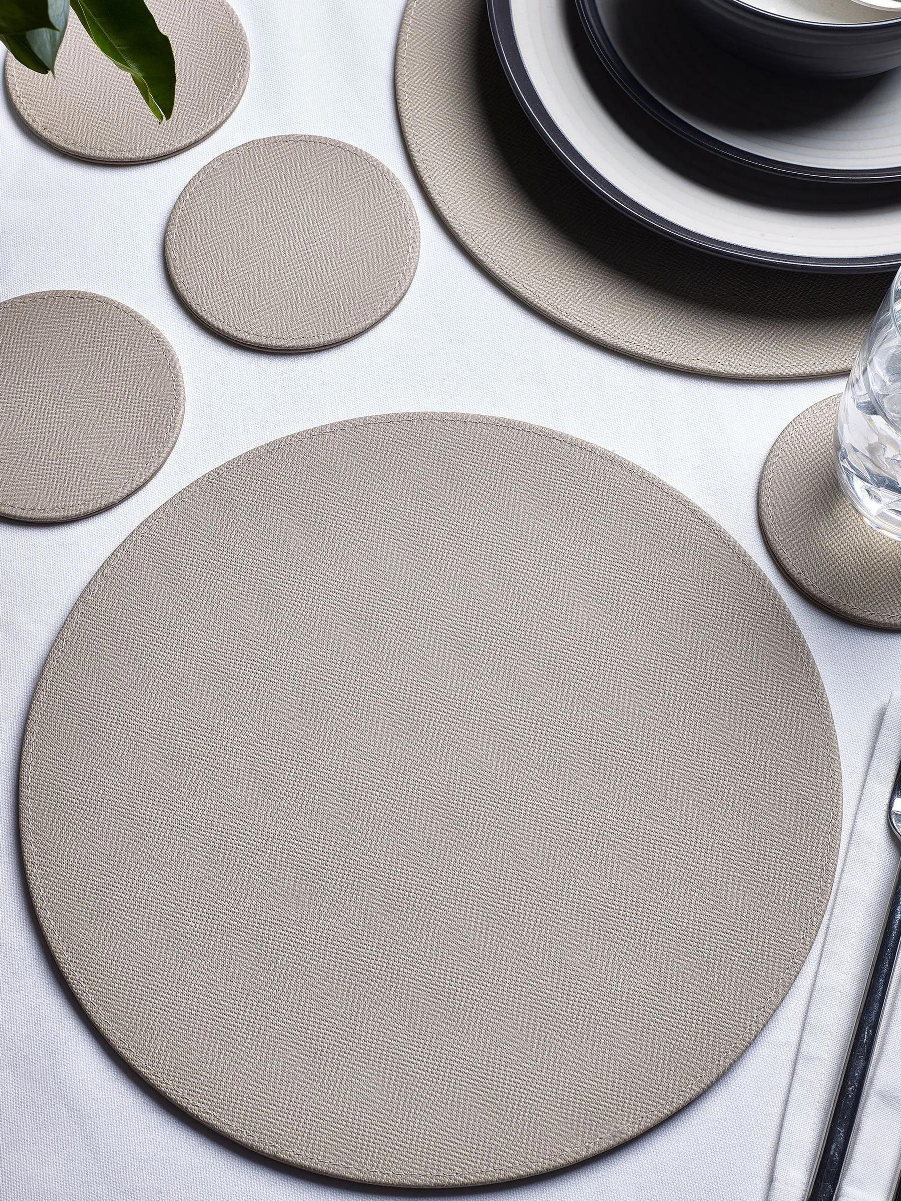 Set van 4 omkeerbare placemats en onderzetters van imitatieleer