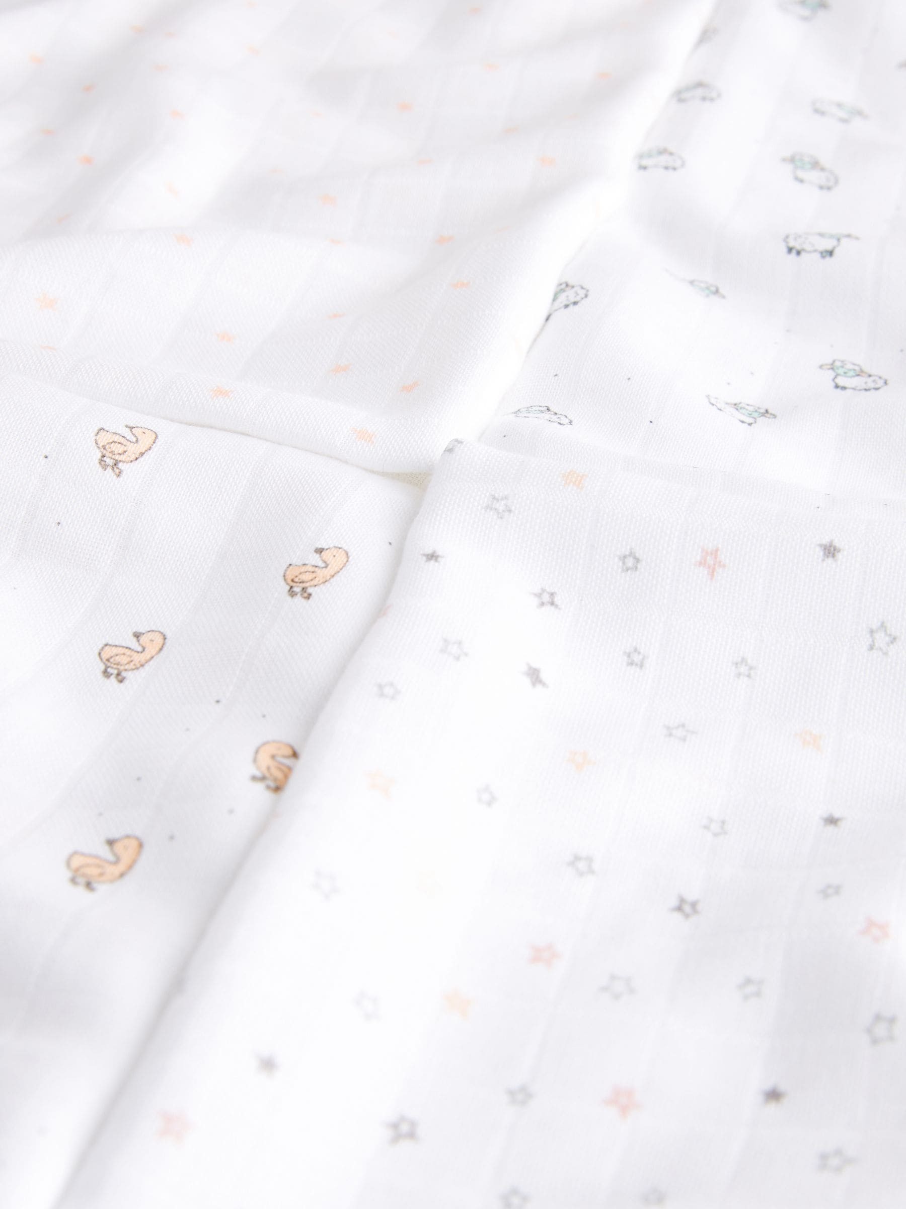 Wit met subtiele dierenprint - Set van 4 mousseline babydoekjes