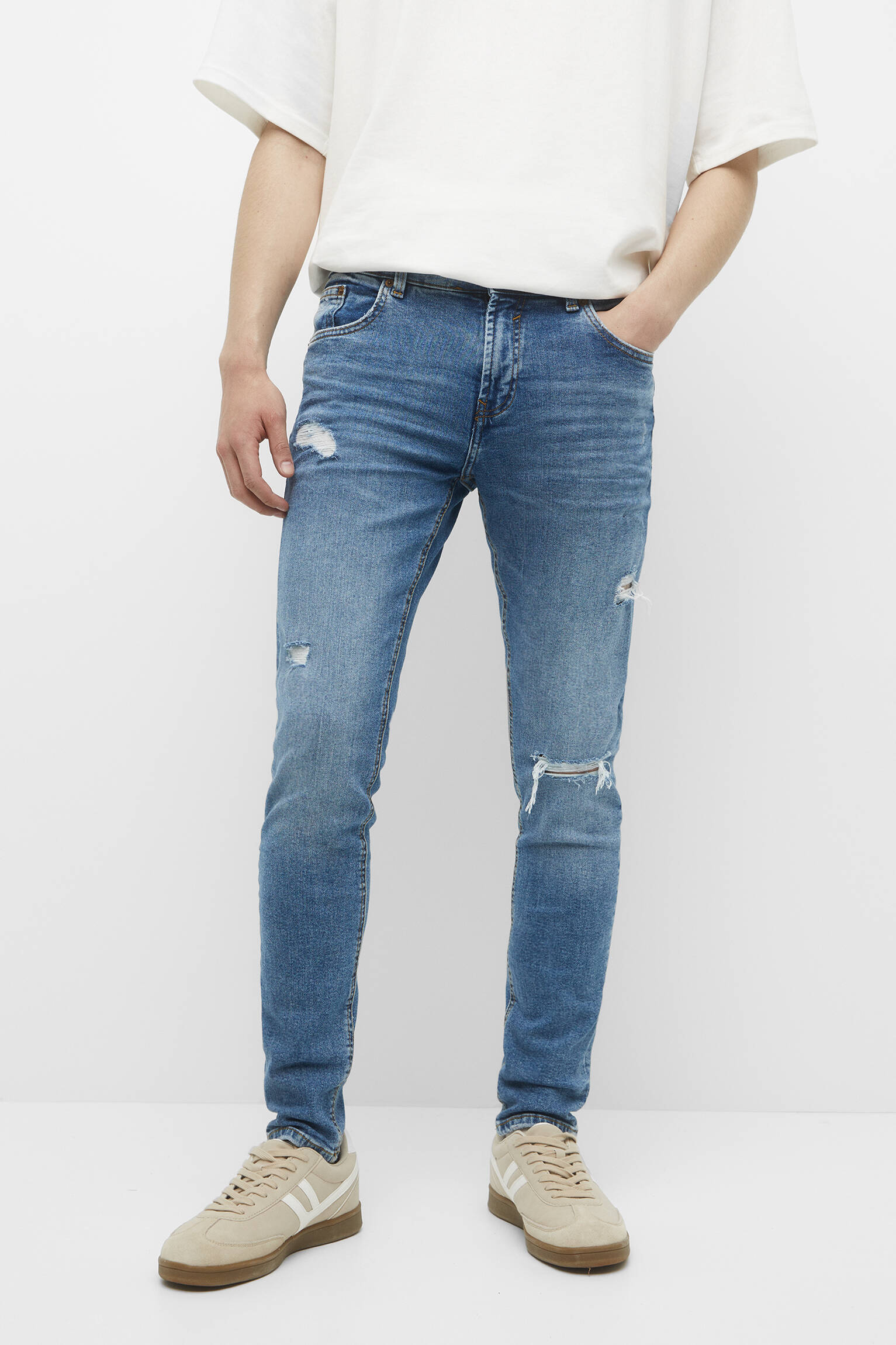 CALÇA JEANS SKINNY RASGADA - AZUL MÉDIO