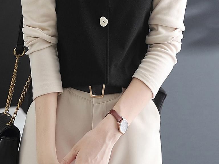 Jeonseon - Blouse met lange mouwen en mockneck en tweekleurige knopen