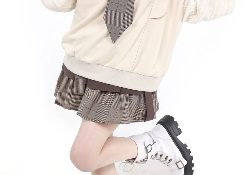 Florimi - Effen overhemd / Oversized sweatshirt met letters / Mini A-lijn rok met hoge taille en ruitmotief