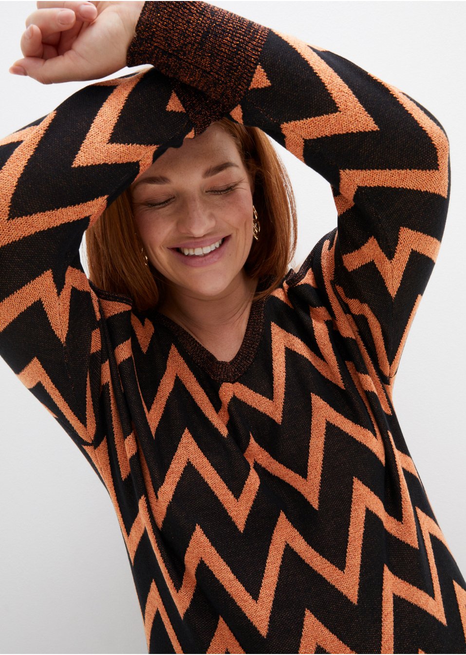 Pull long à découpes