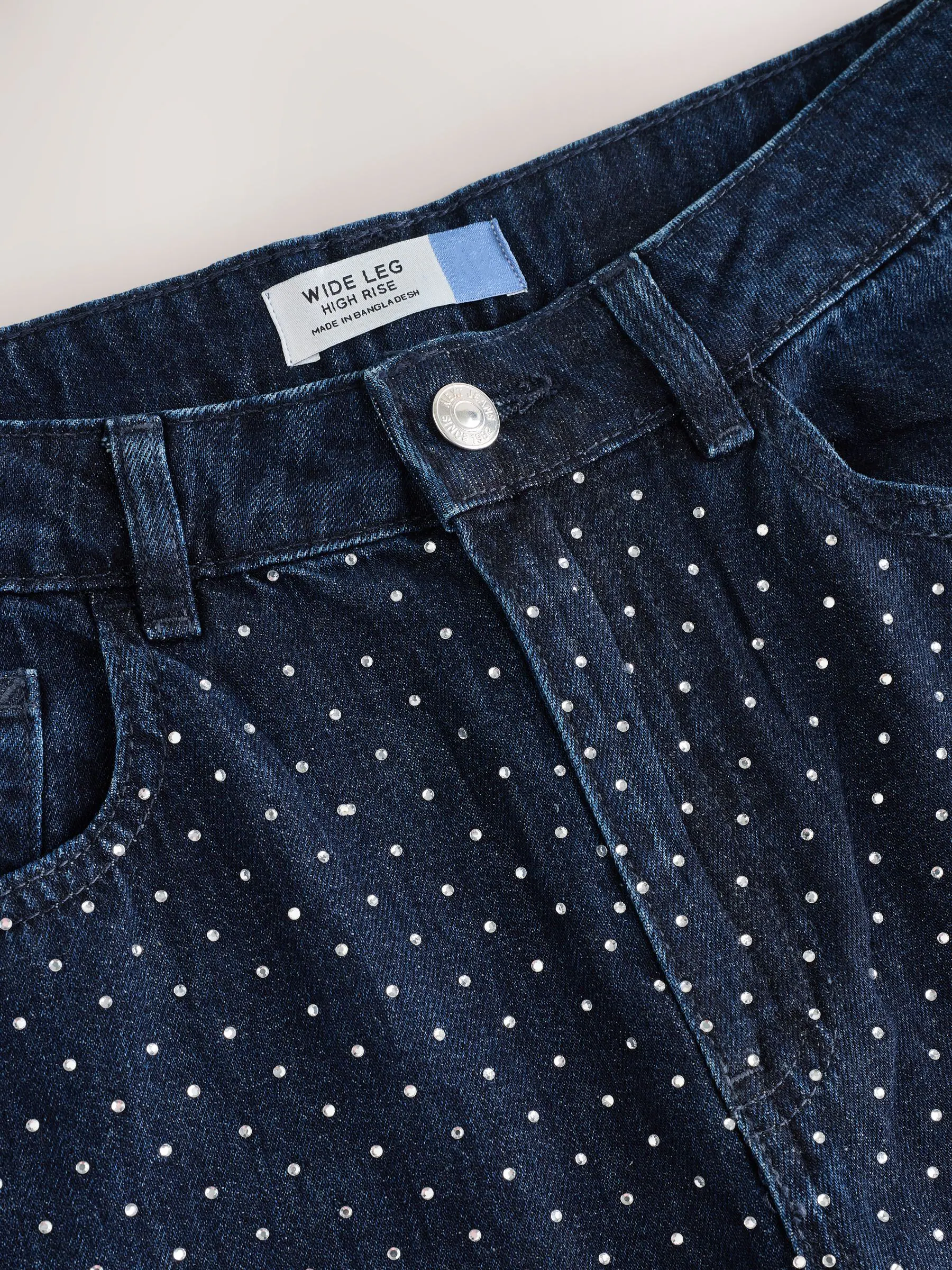 Blauw met wassing - Versierde jeans met wijde pijpen