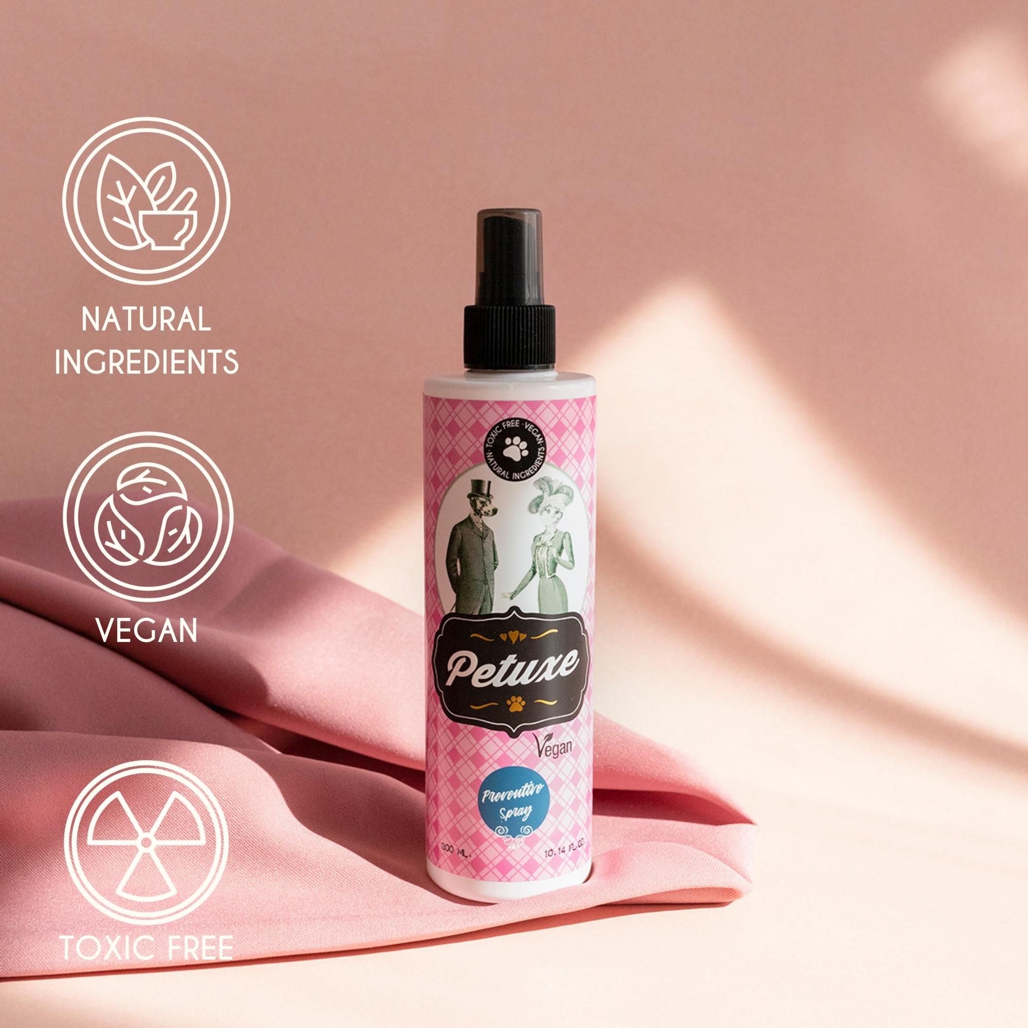 Spray preventivo Petuxe para animais de estimação com óleo de melaleuca e vinagre de quassia.