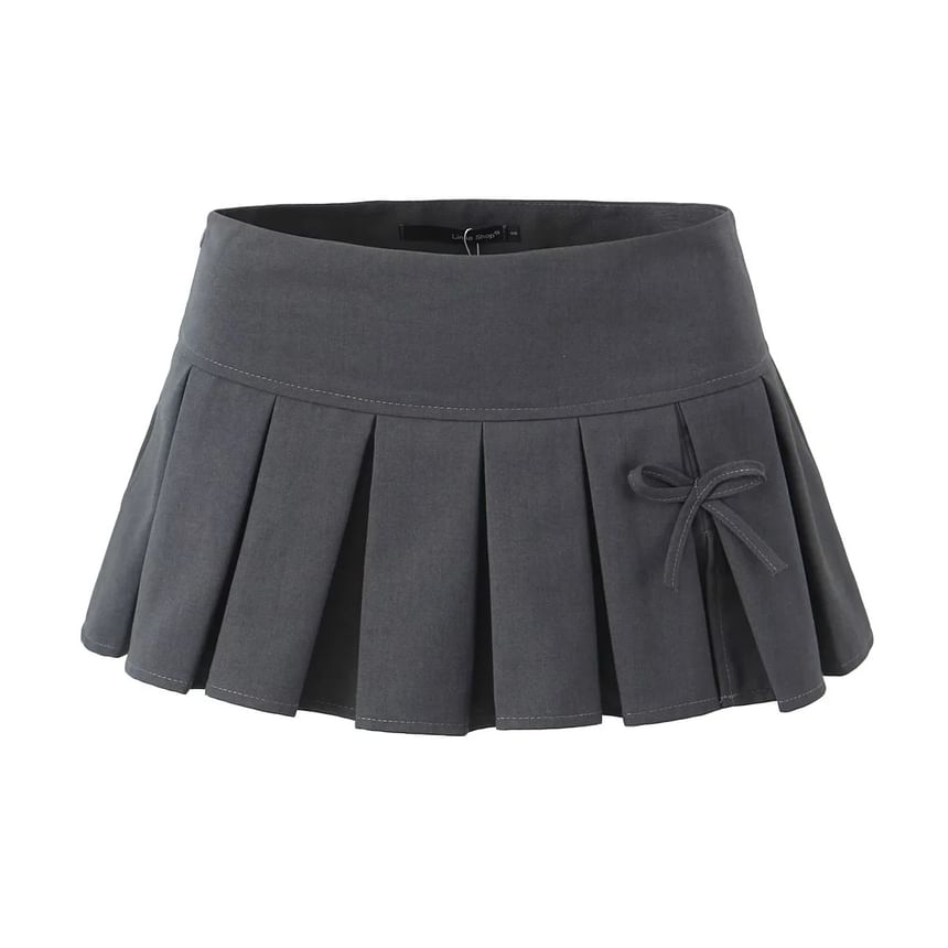 Asiris - Laag uitgesneden geplooide rok met strikaccent