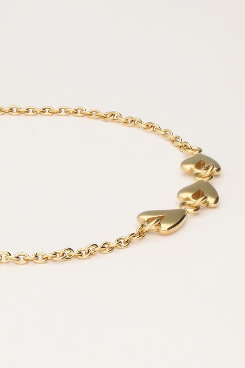 Minimalistische armband met drie hartjes