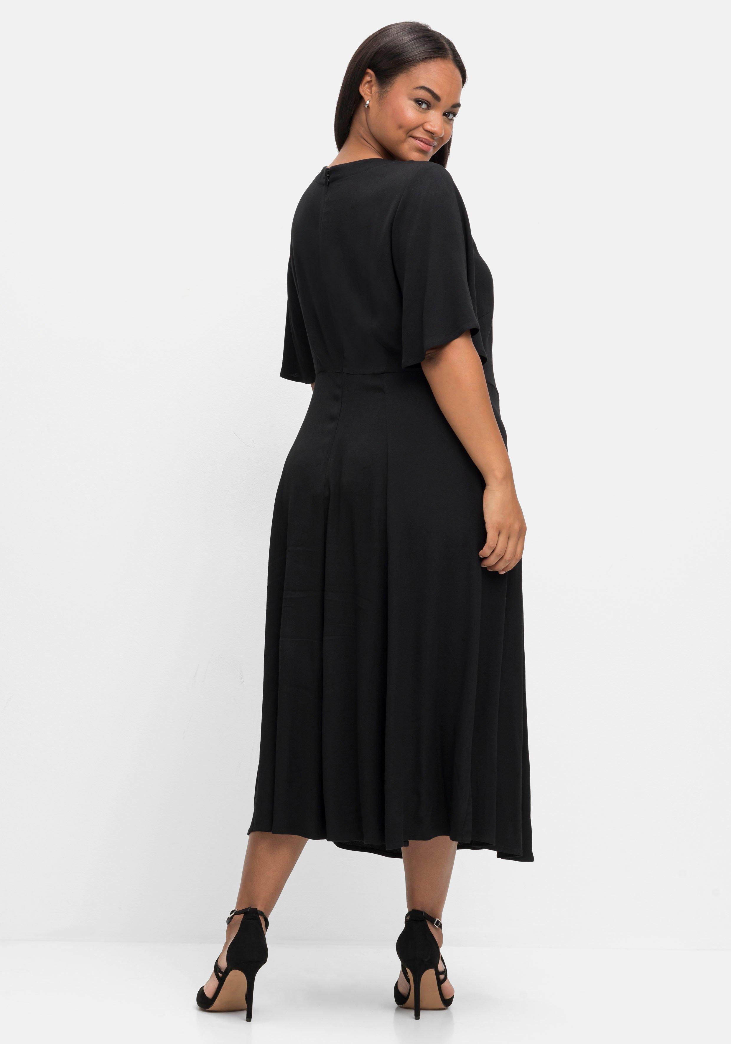 Abendkleid mit Pailletten am V-Ausschnitt
