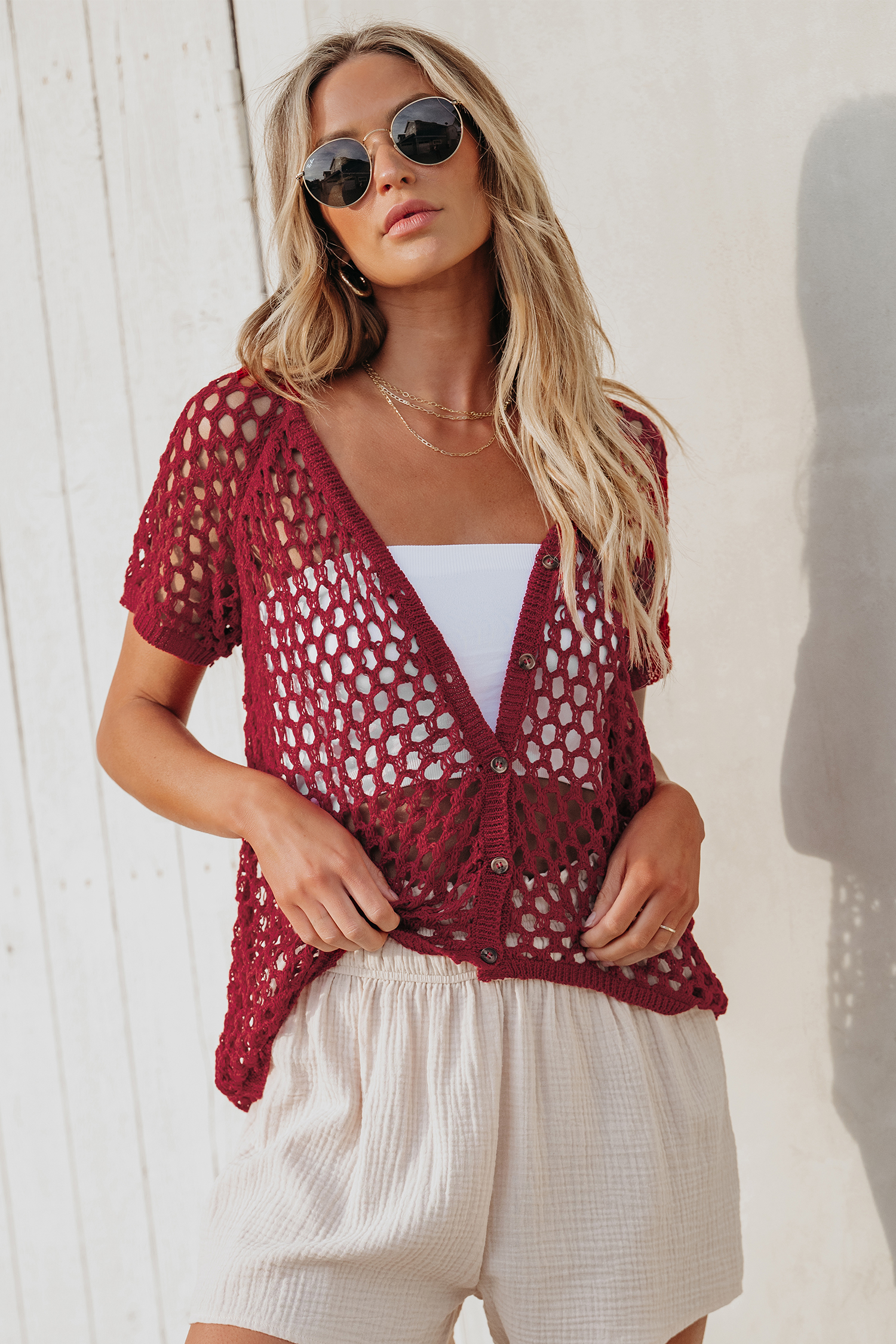 Haut cover up en tricot ouvert à boutons sur le devant
