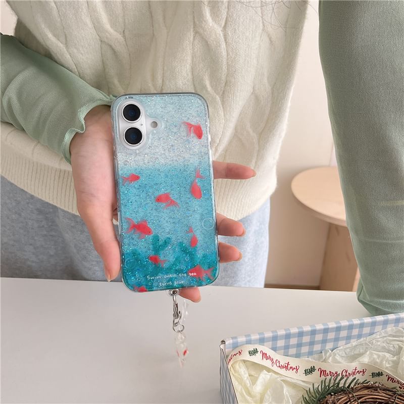 Edgin - Vis Glitter Telefoonhoesje / Bandje / Set - iPhone 16 Pro Max / 16 Pro / 16 Plus / 16 / 15 Pro Max / 15 Pro / 15 Plus / 15 / 14 Pro Max / 14 Pro / 14 Plus / 14 / 13 Pro Max / 13 Pro / 13 / 13 Mini
