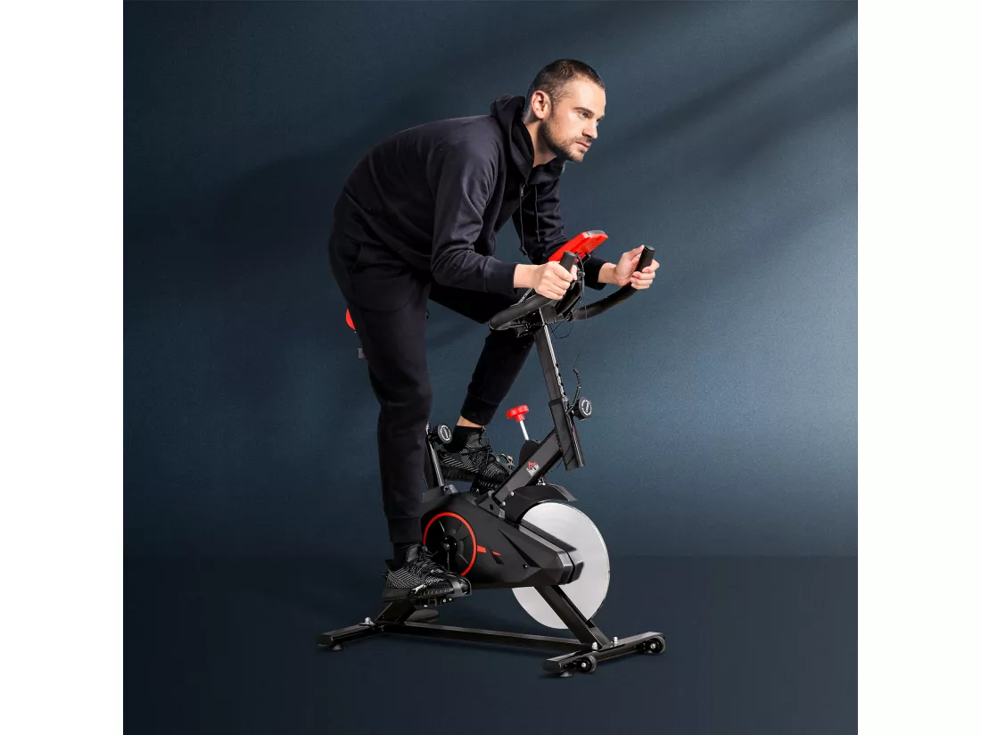 Vélo d'appartement avec écran LCD multifonctions vélo biking cardio training selle et guidon réglables volant inertie 6 Kg acier noir rouge