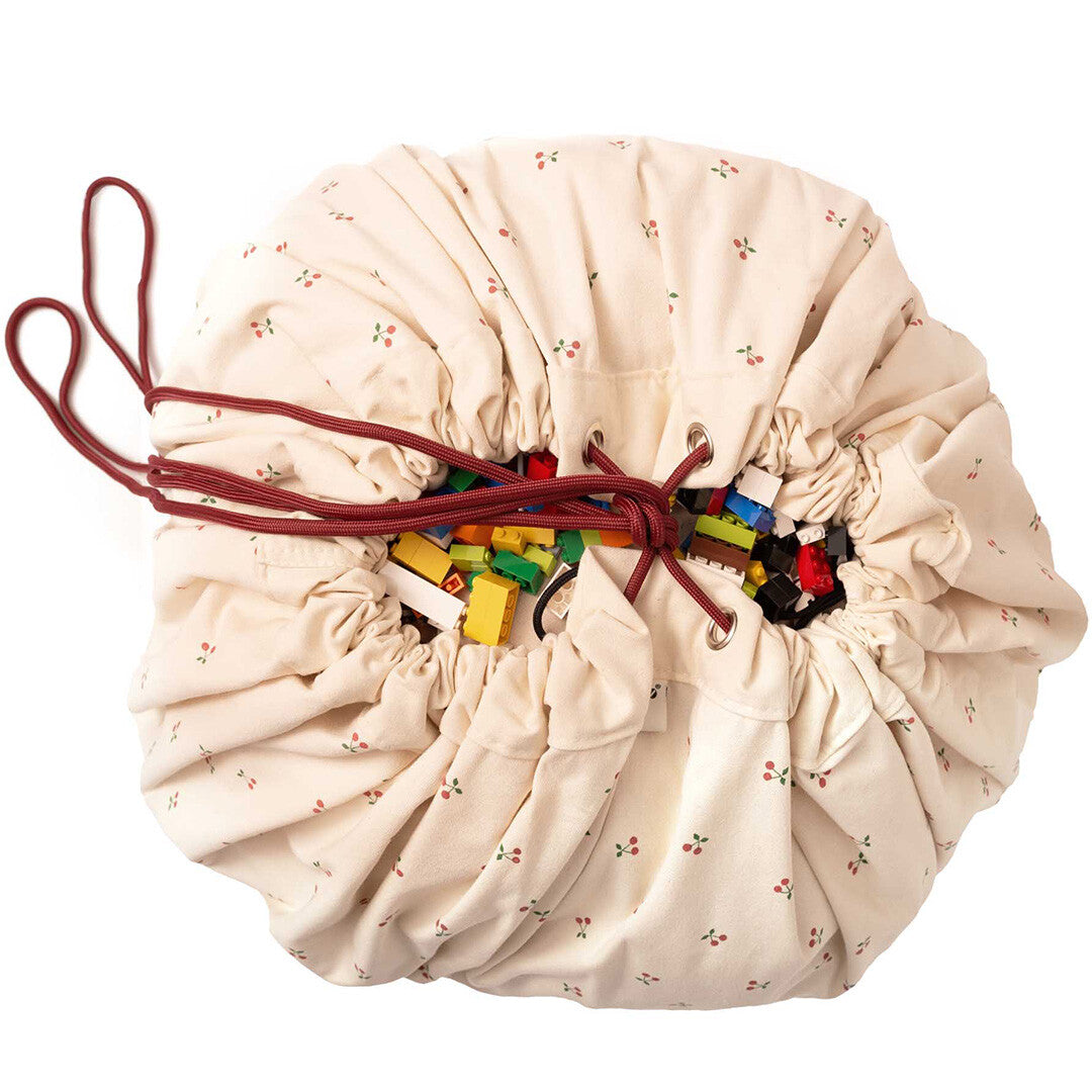 play&go speelkleed en opbergzak noomad - cherry cherry
