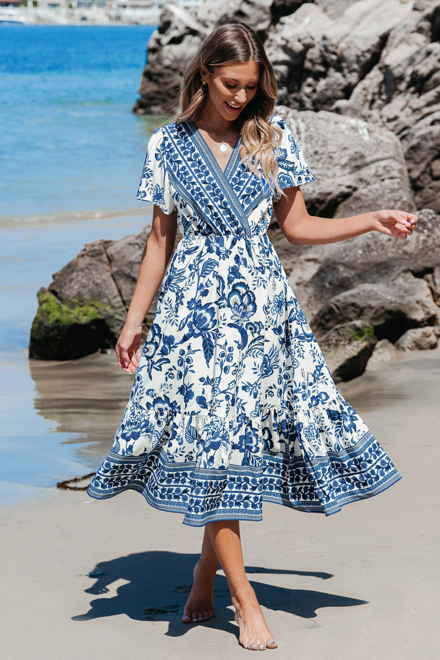 Robe midi avec col surplis à volants et imprimé floral