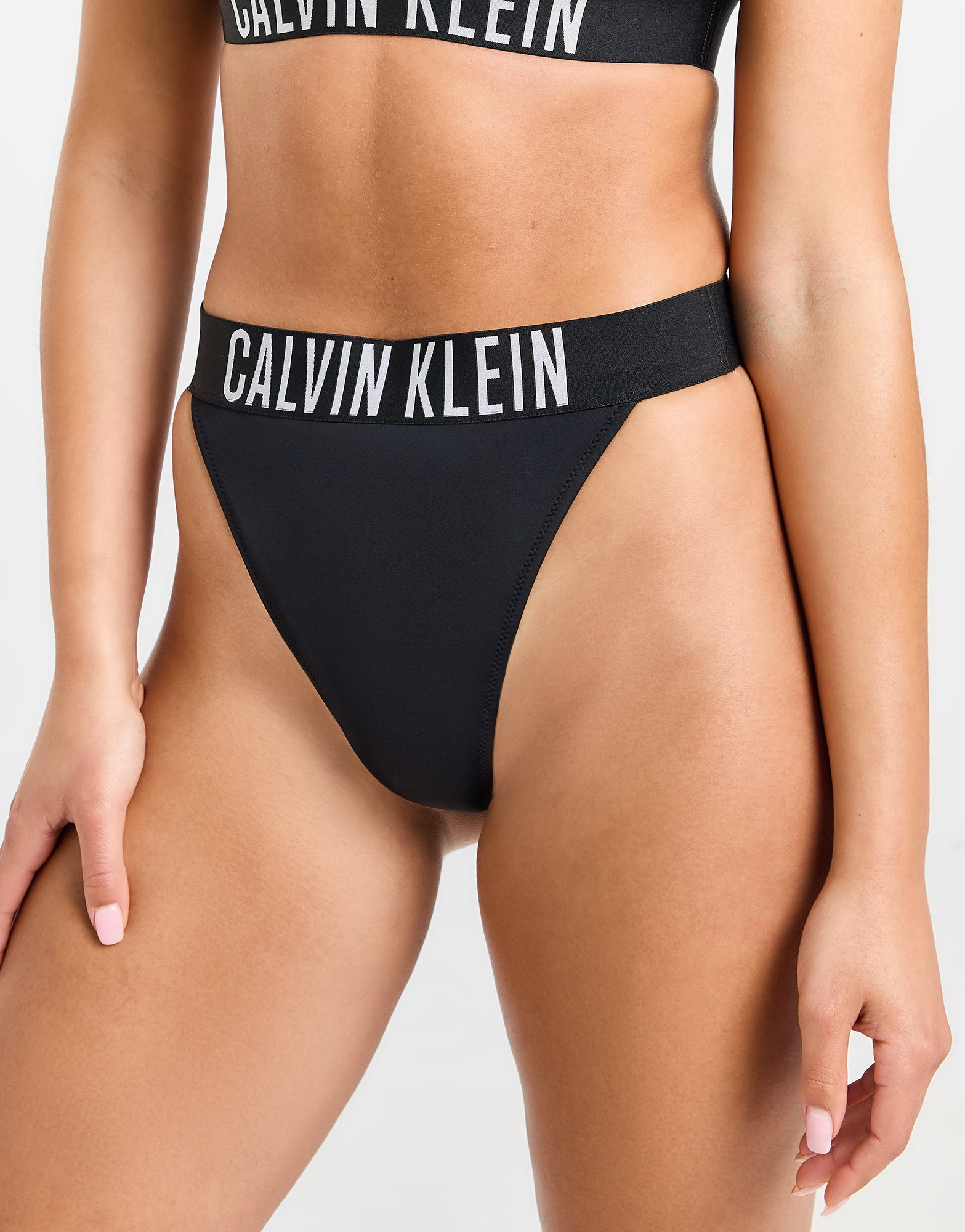 Calvin Klein Swim Bas de bikini String Intense Femme