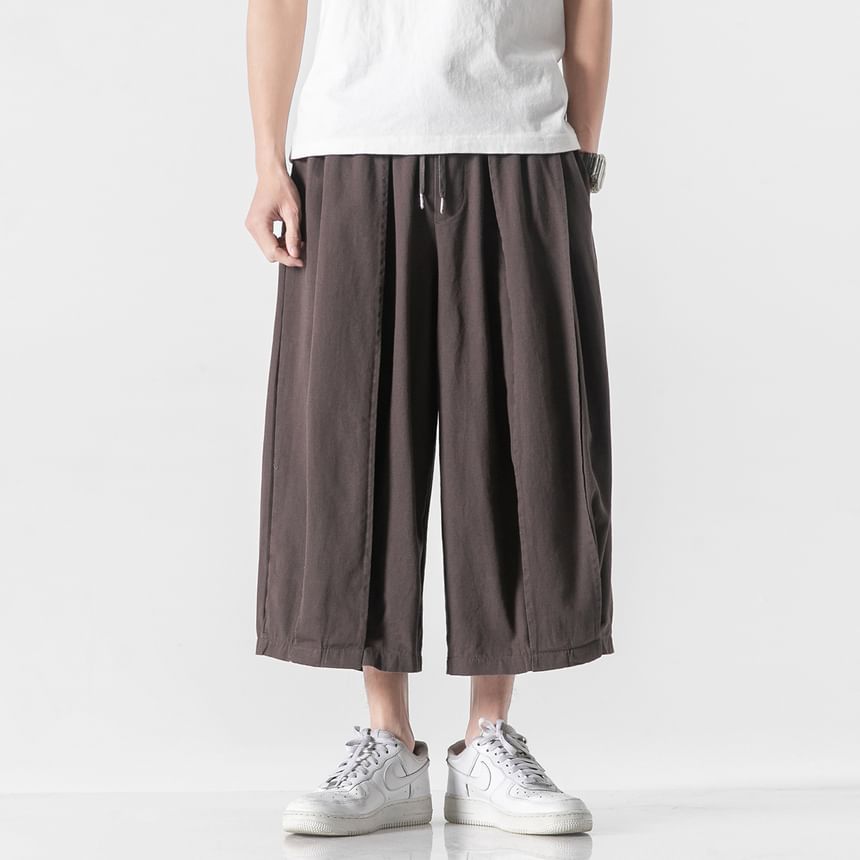 Orungeetun - Effen cropped broek met wijde pijpen en trekkoordtaille