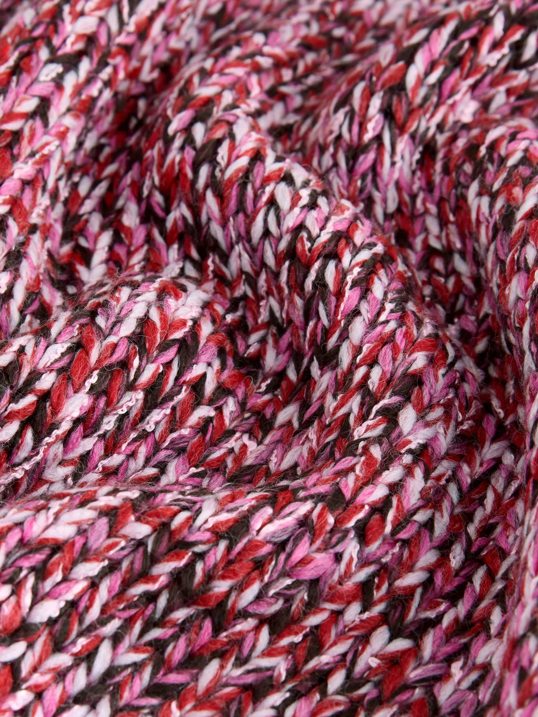 Roze met multiprint - Gebreide trui met twist van wol