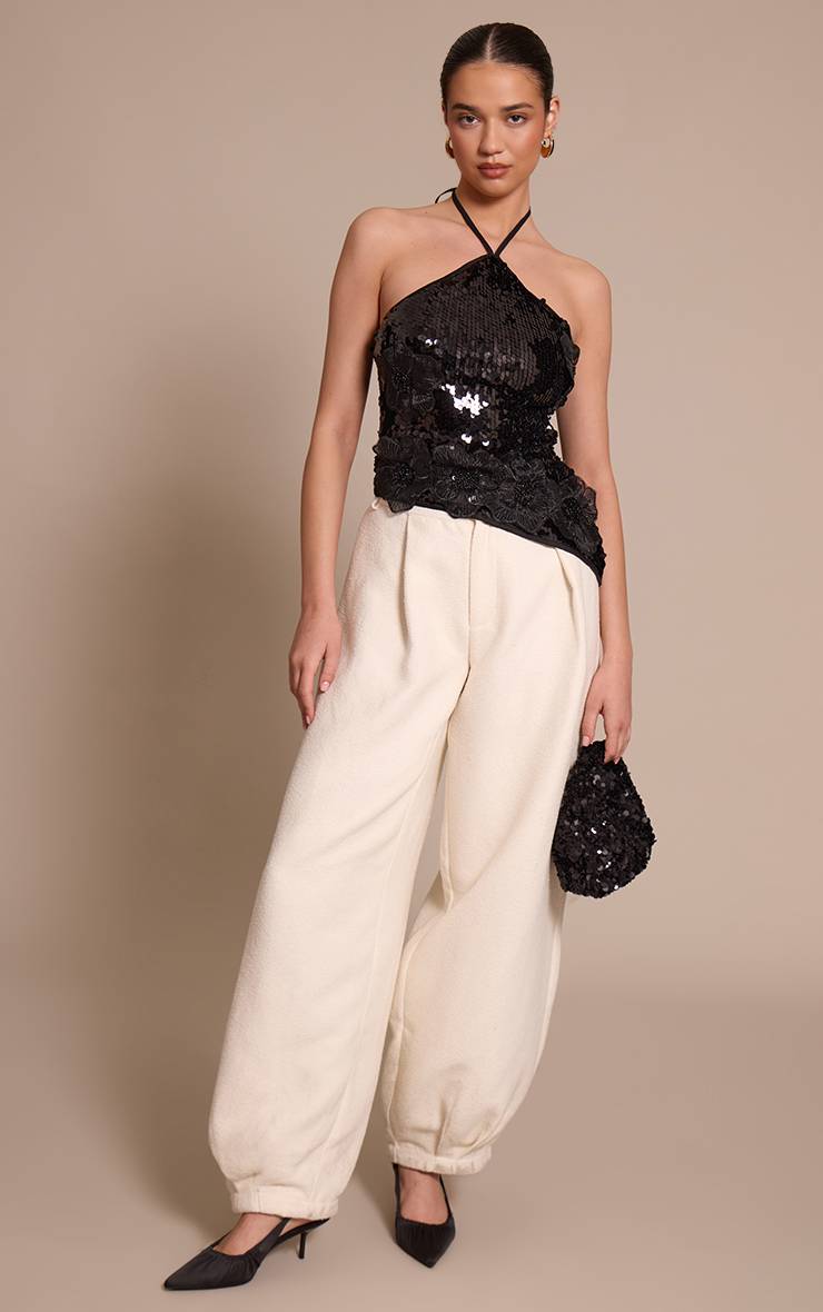 Noir Haut Asymétrique À Détails De Fleurs En Sequins