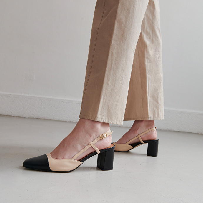 Babies à talons  en cuir noir et beige
