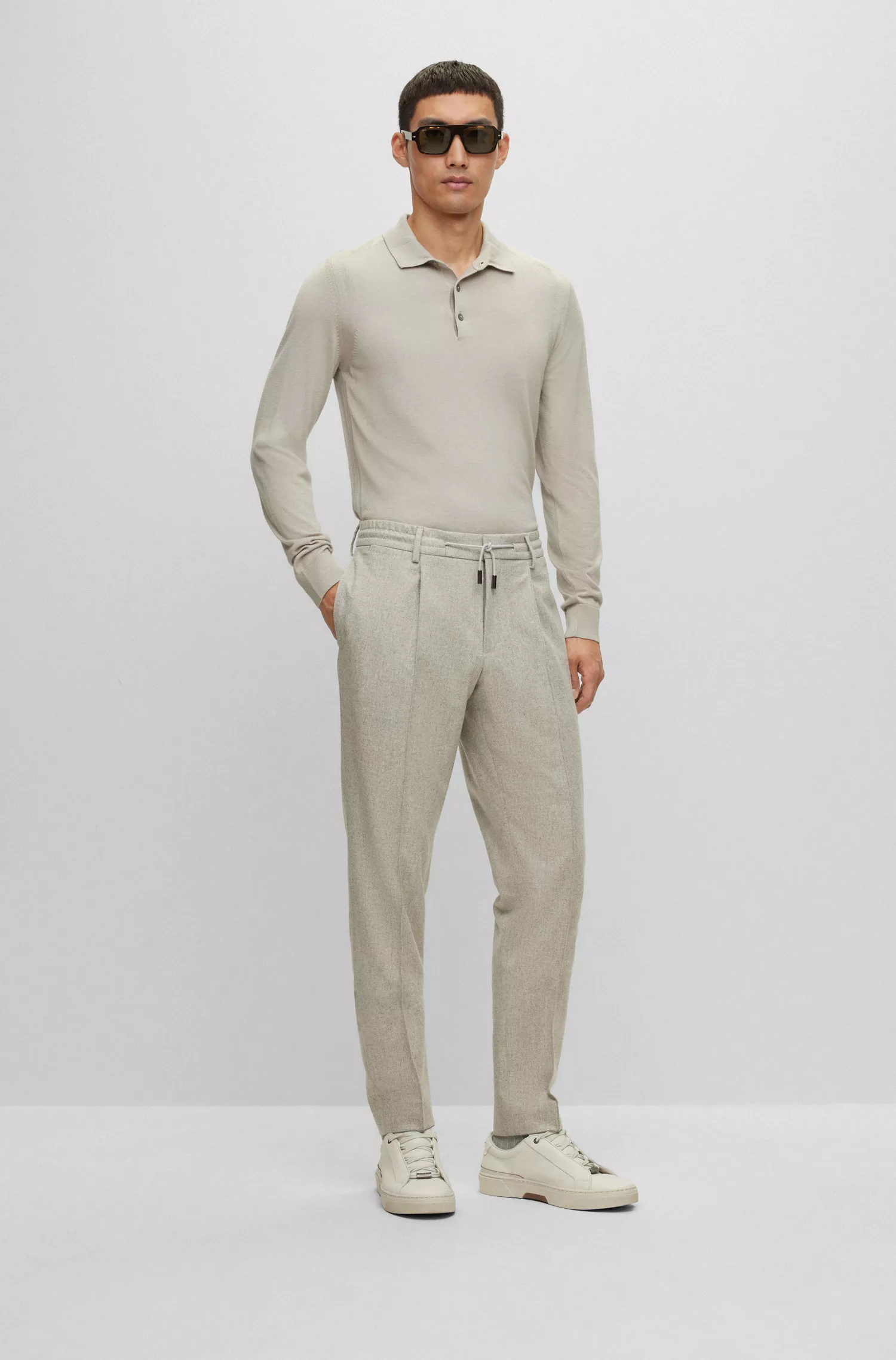 Calça BOSS Camel de corte slim em lã com microestampa e detalhes em cashmere.