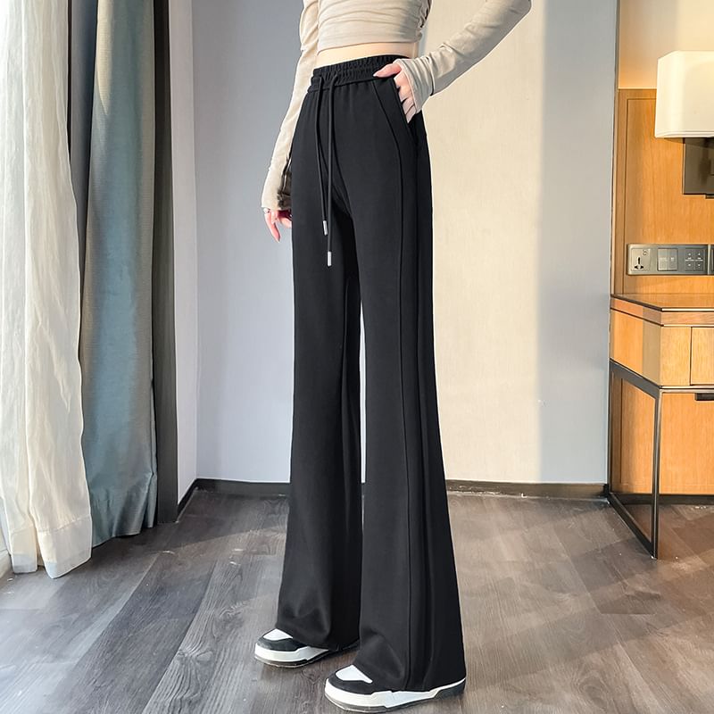 Lexama - Effen wijd uitlopende joggingbroek met trekkoord in de taille
