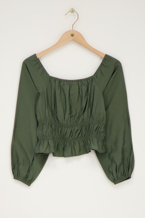 Donkergroene off shoulder top met ruffles